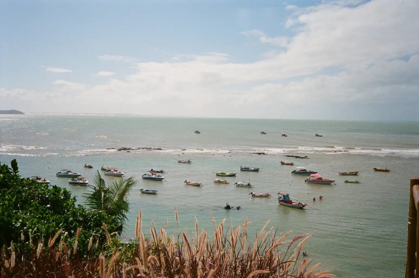 Fishing boats moored on the water at Pipa